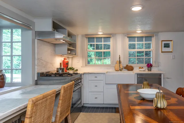 a view of a dining room kitchen and a window