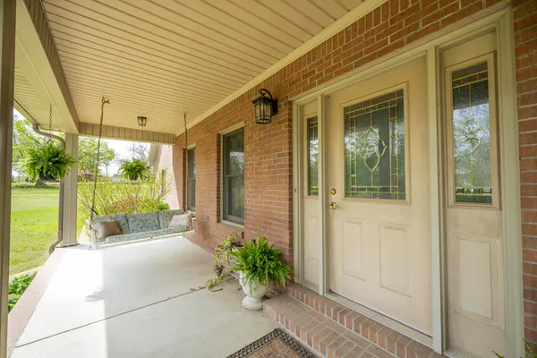 a porch with seating space