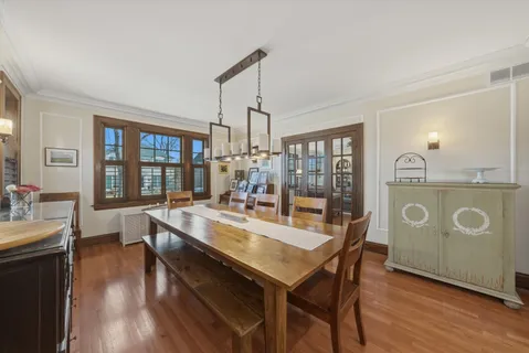 a kitchen with granite countertop a stove a sink and dishwasher