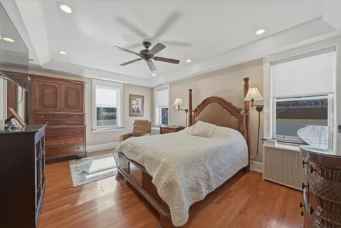 a bathroom with a double vanity sink a shower and a mirror