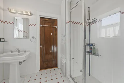 a bedroom with a bed furniture and a window