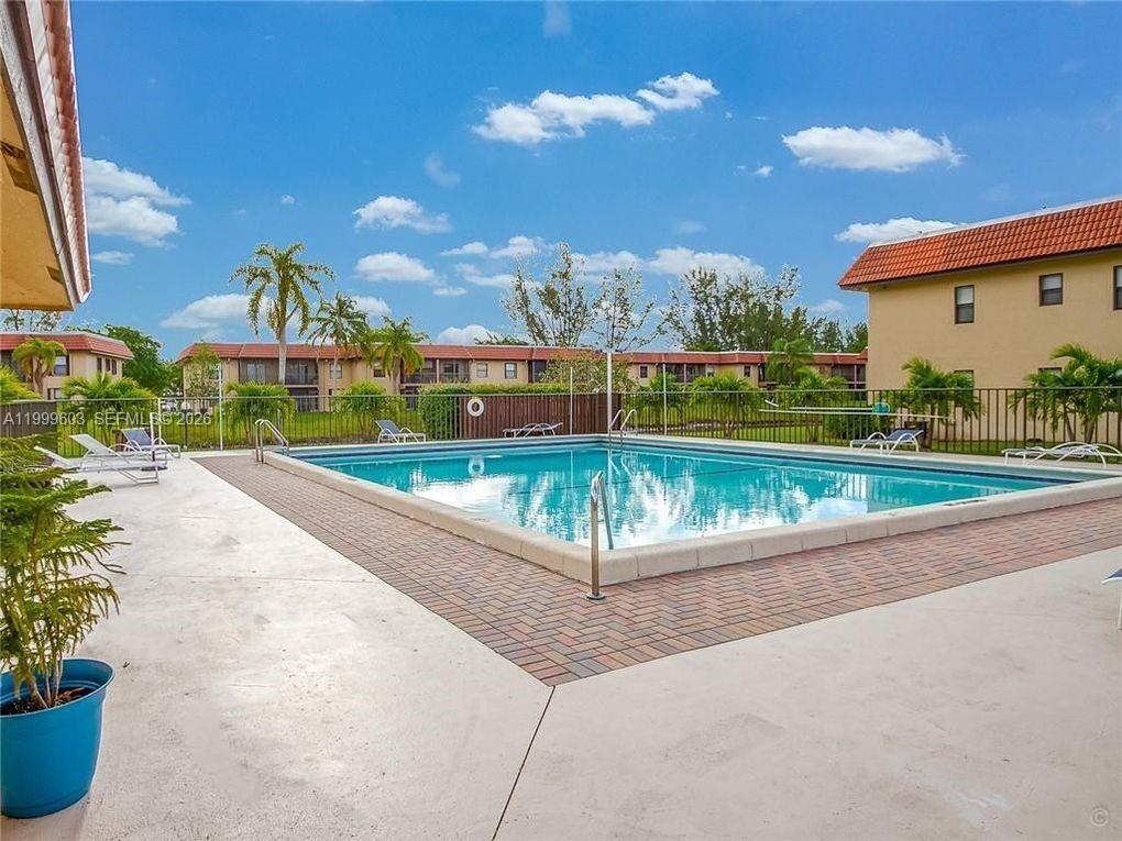 21904 Lake Forest Circle, Unit 203 Boca Raton, FL 33433 - Photo 11 of 11 a view of a basket ball ground