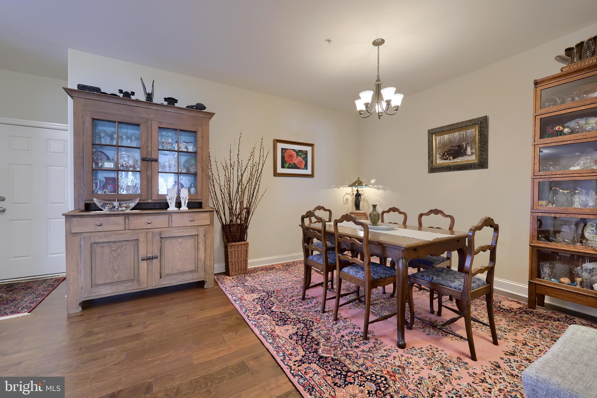 364 Pin Oak Drive Lititz, PA 17543 - Photo 11 of 39 a view of a dining room with furniture window and wooden floor