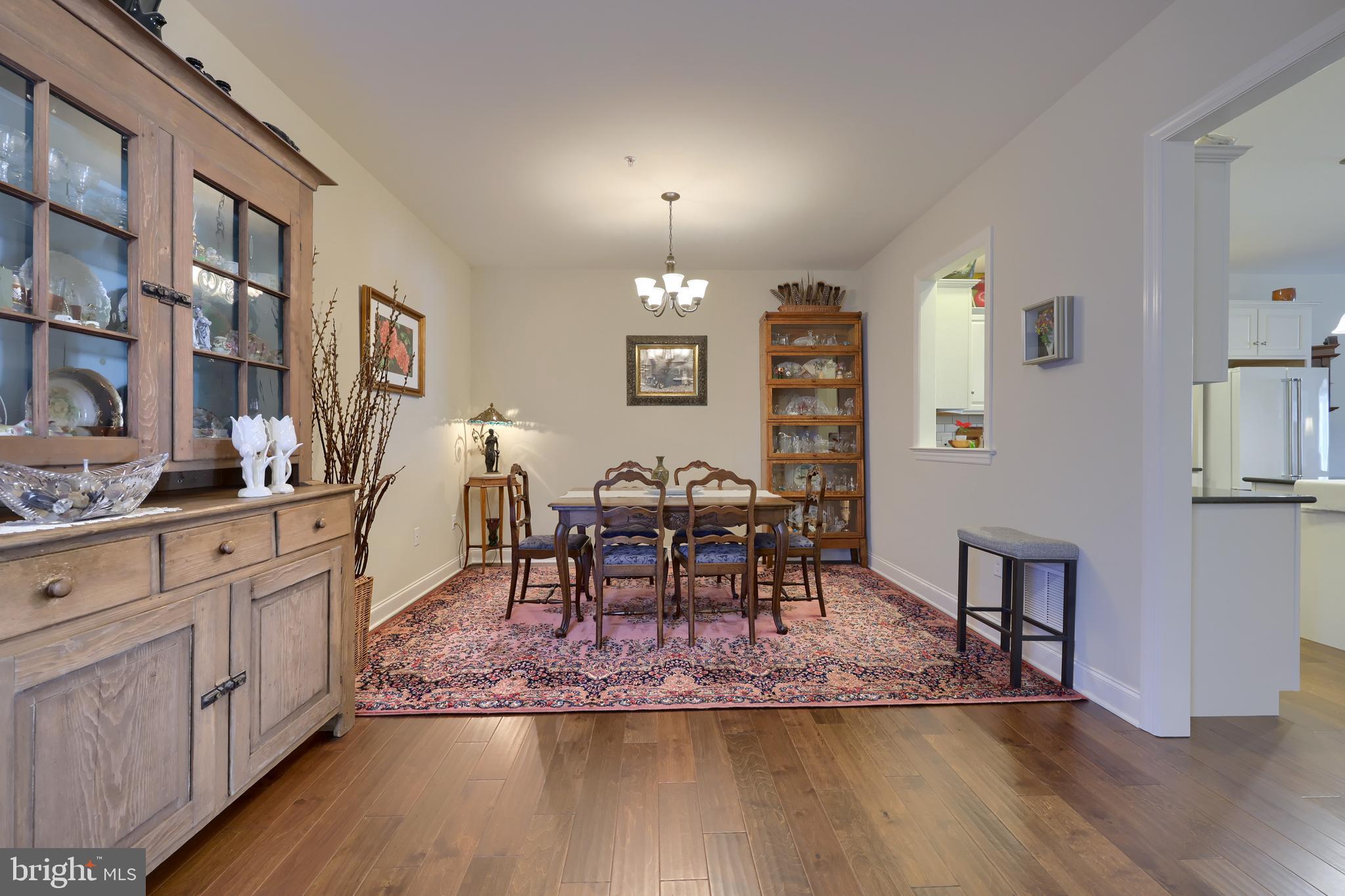 364 Pin Oak Drive Lititz, PA 17543 - Photo 12 of 39 a view of a a dining room with furniture window and wooden floor
