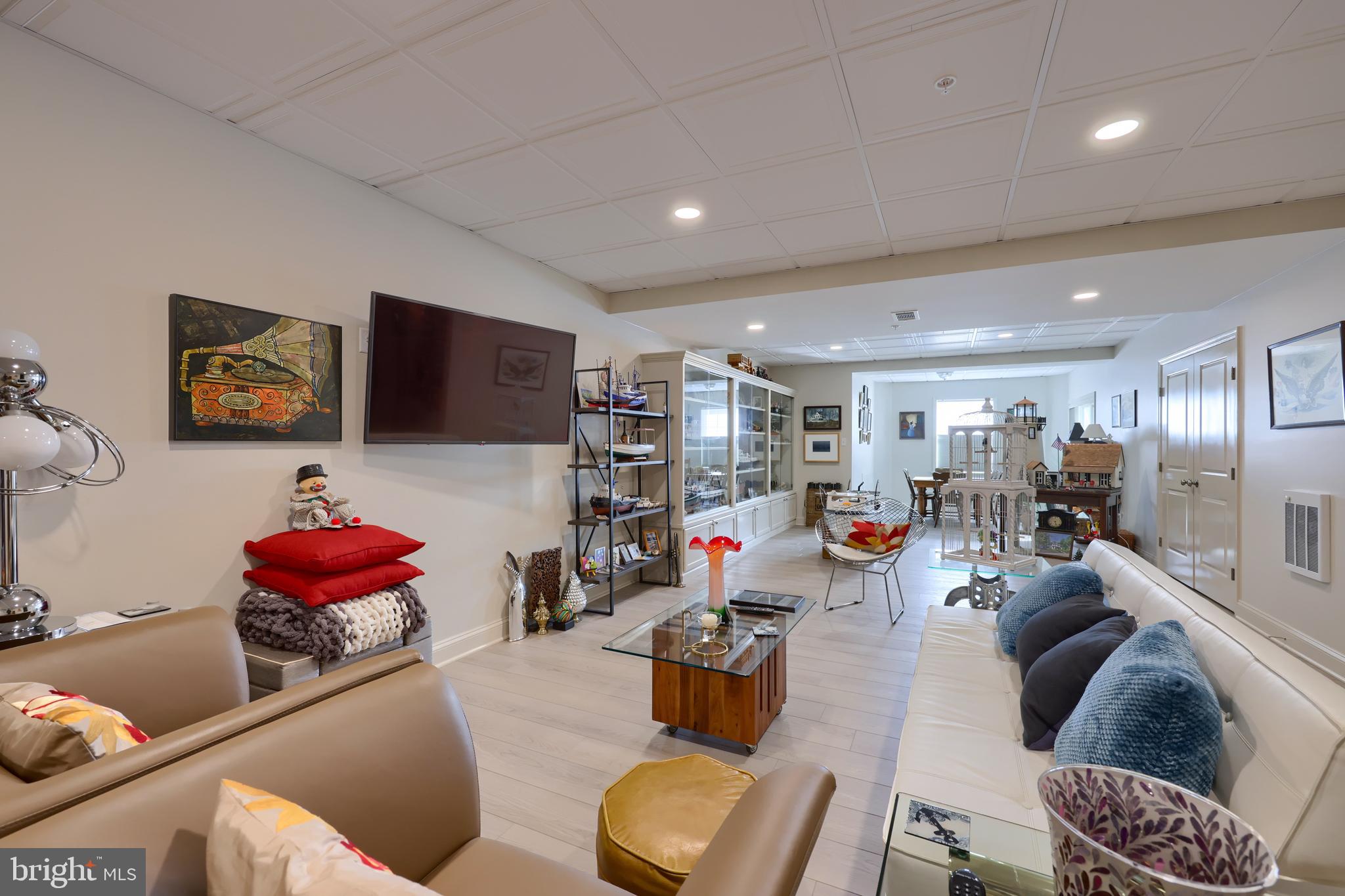 364 Pin Oak Drive Lititz, PA 17543 - Photo 29 of 39 a living room with lots of furniture and a flat screen tv