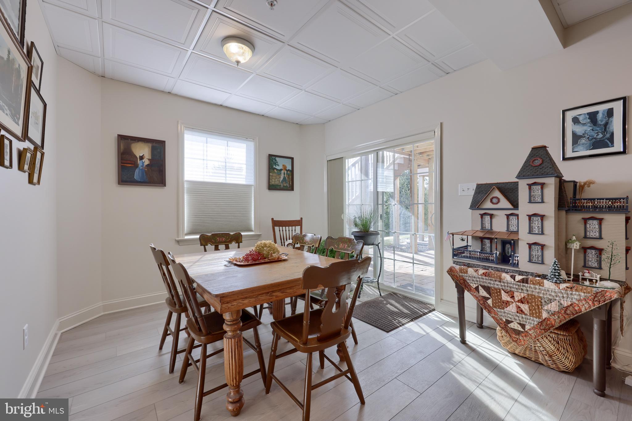 364 Pin Oak Drive Lititz, PA 17543 - Photo 33 of 39 a view of a dining room with furniture and a large window