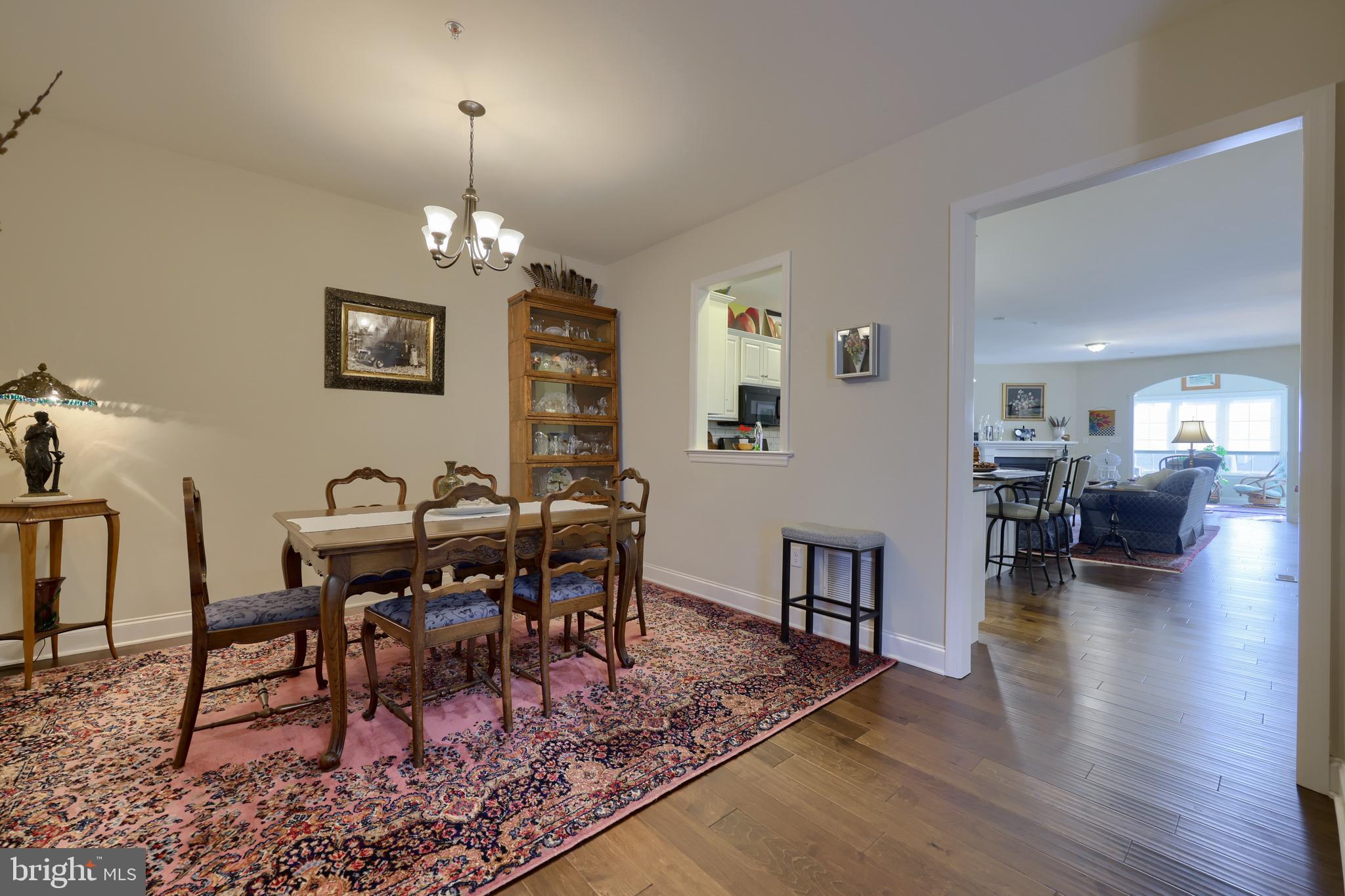 364 Pin Oak Drive Lititz, PA 17543 - Photo 8 of 39 a view of a dining room with furniture and wooden floor