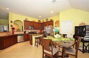25411 Overbrook Terrace Lane Katy, TX 77494 - Photo 7 of 30 A view of the kitchen with stainless steel appliances and the breakfast room.