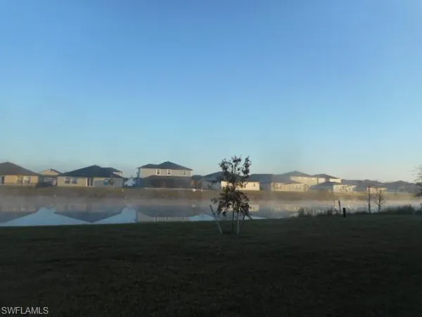 a view of lake with mountain