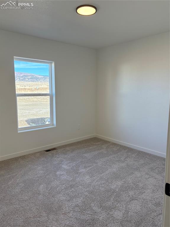 834 Keystone Loop Canon City, CO 81212 - Photo 14 of 22 an empty room with a window