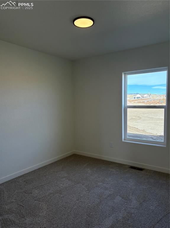 834 Keystone Loop Canon City, CO 81212 - Photo 16 of 22 an empty room with a window