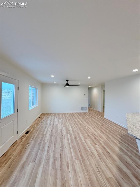 834 Keystone Loop Canon City, CO 81212 - Photo 6 of 14 a view of an empty room and wooden floor