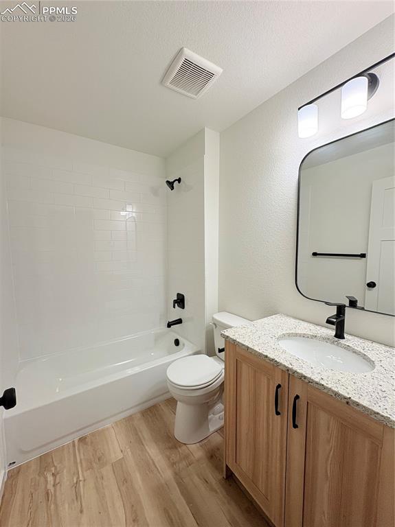 834 Keystone Loop Canon City, CO 81212 - Photo 7 of 14 a bathroom with a granite countertop sink a toilet and a mirror