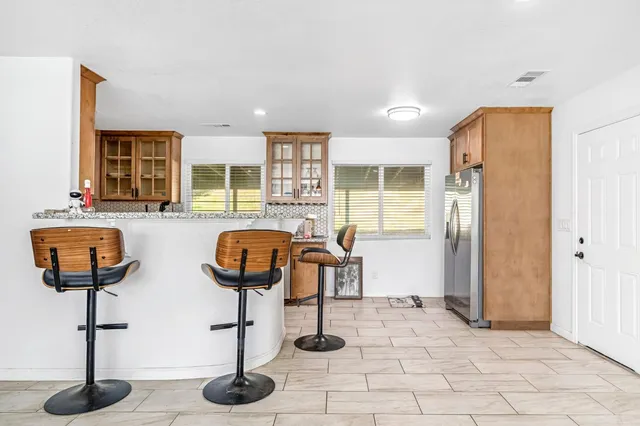 a view of entryway wih livingroom and couch
