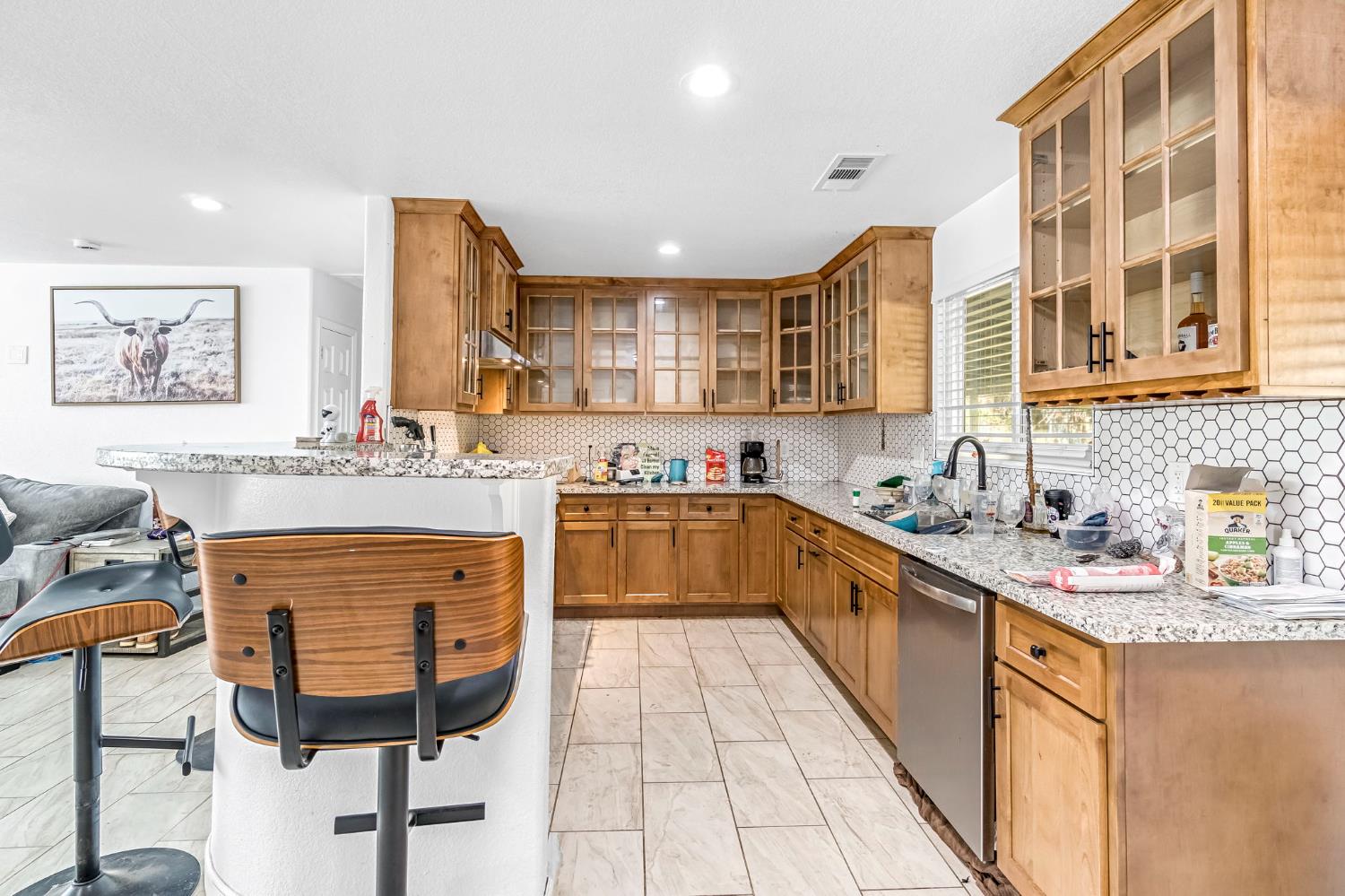 34045 George Smith Road Squaw Valley, CA 93675 - Photo 14 of 37 a large kitchen with stainless steel appliances granite countertop a sink and cabinets