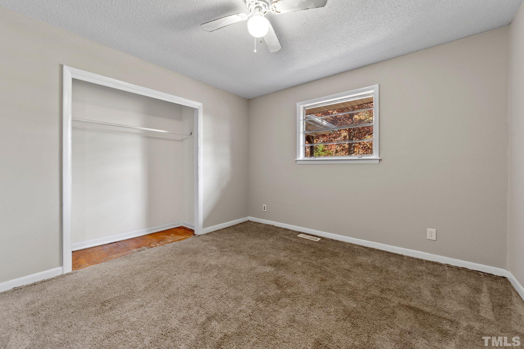 801 Avalon Road Durham, NC 27704 - Photo 24 of 30 a view of an empty room with a window