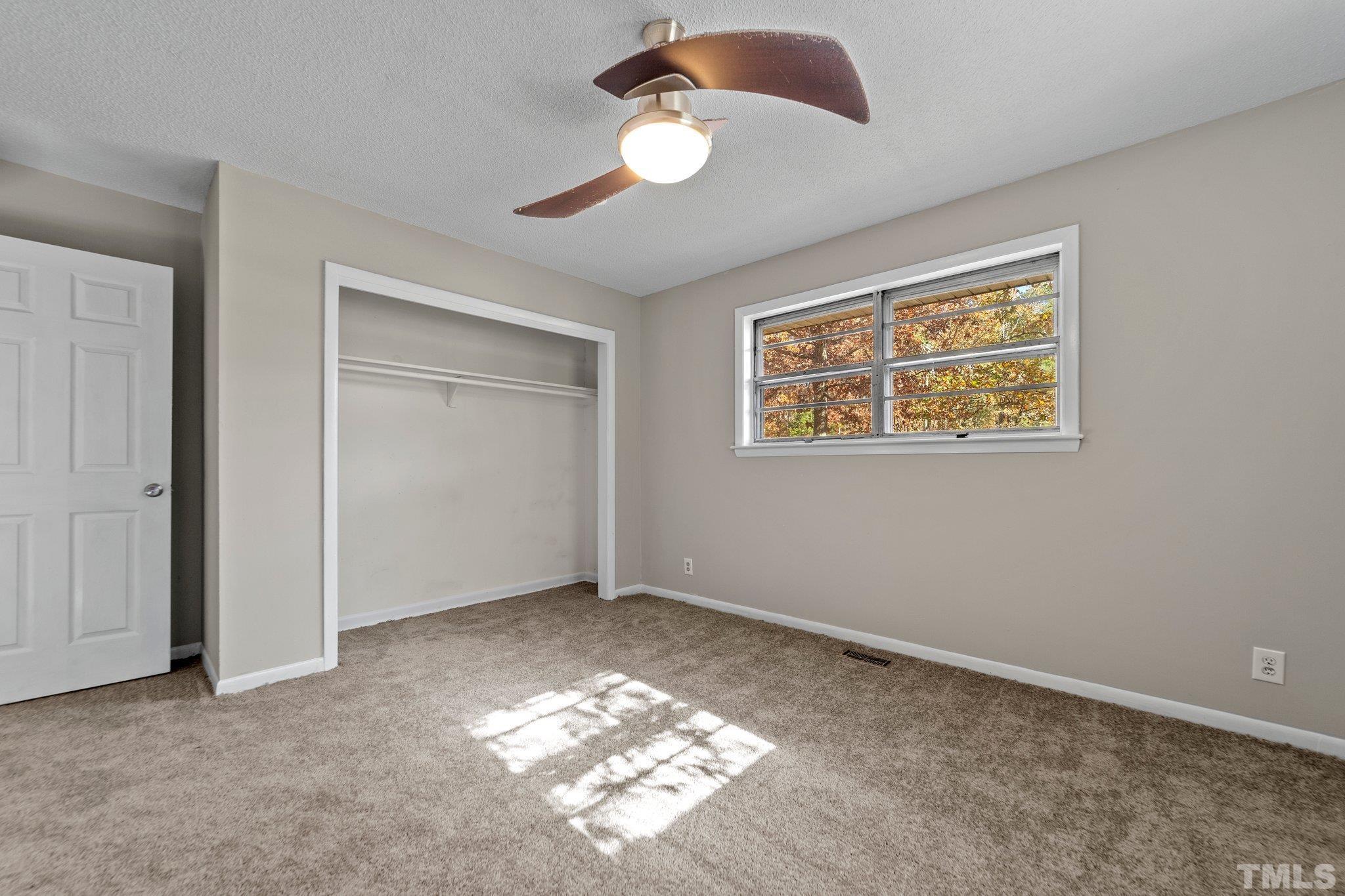 801 Avalon Road Durham, NC 27704 - Photo 26 of 30 a view of an empty room with a window