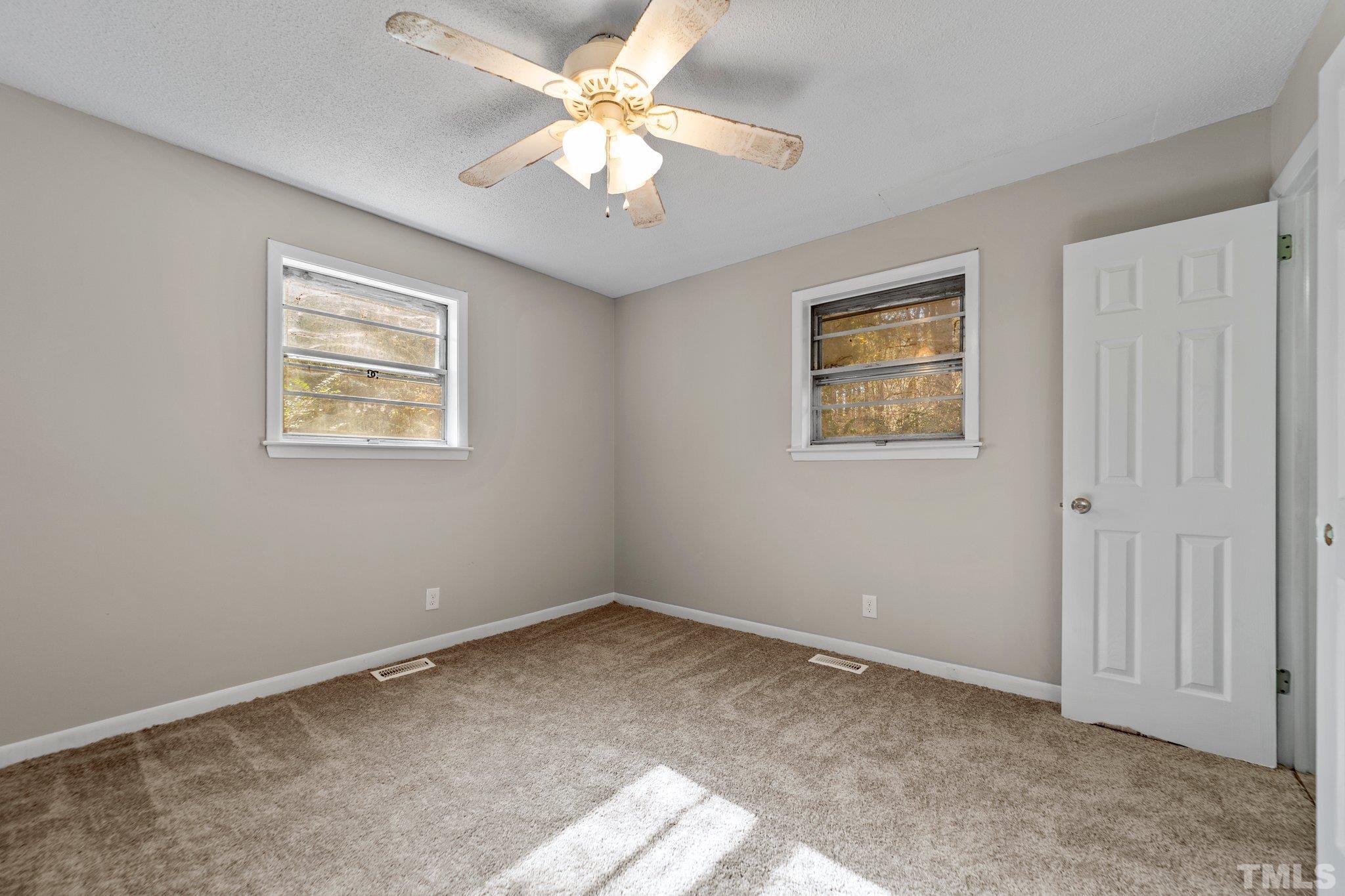 801 Avalon Road Durham, NC 27704 - Photo 30 of 30 a view of an empty room with a window