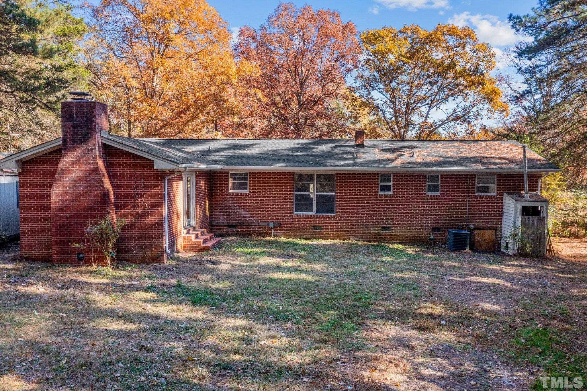 801 Avalon Road Durham, NC 27704 - Photo 6 of 30 a view of a house with backyard