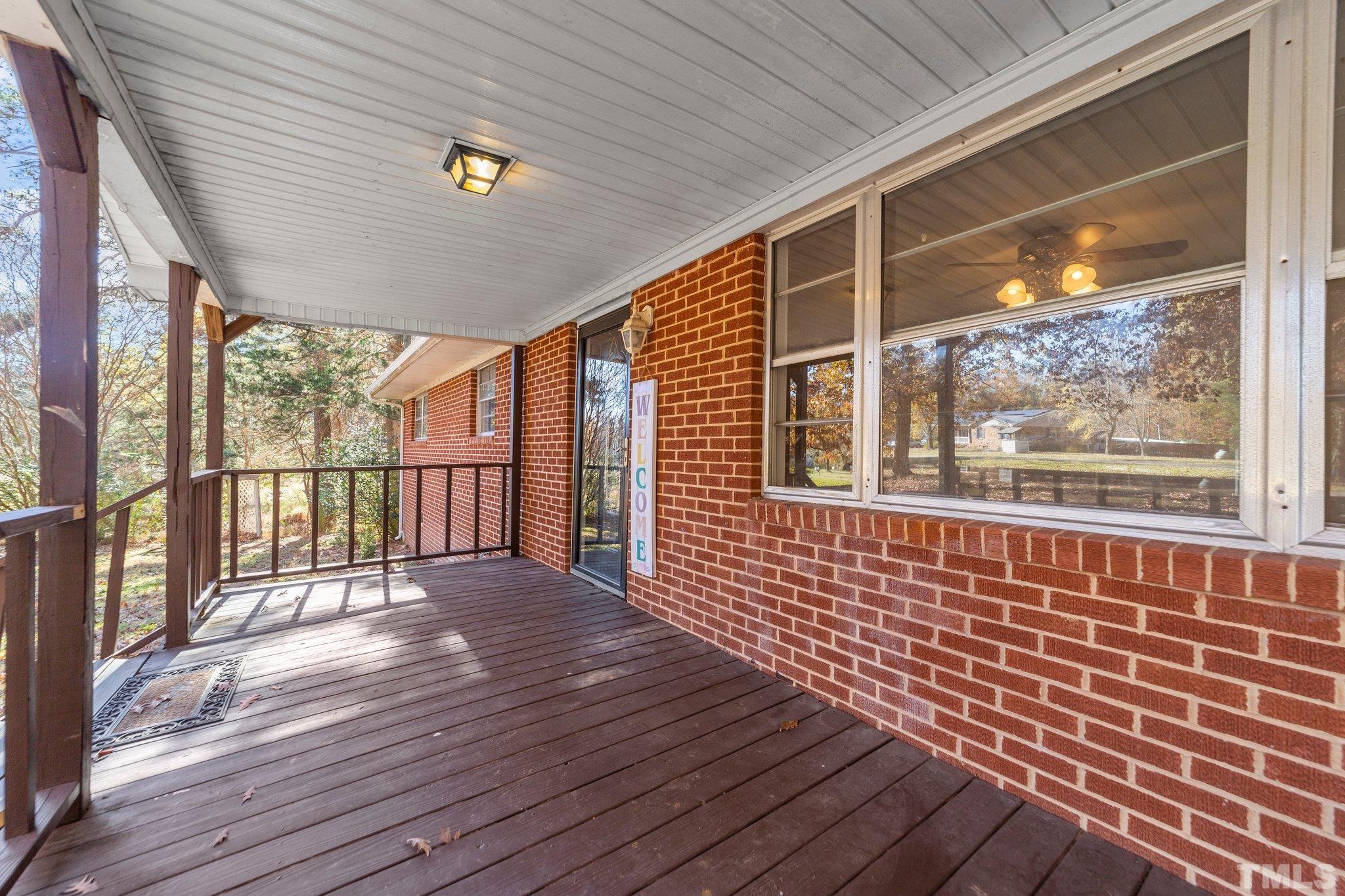 801 Avalon Road Durham, NC 27704 - Photo 8 of 30 a view of a porch with wooden floor