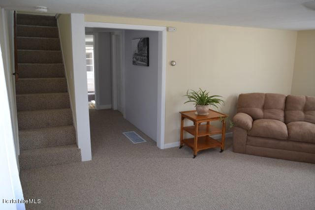 2793 State Road Richmond, MA 01254 - Photo 11 of 20 a living room with furniture and a potted plant