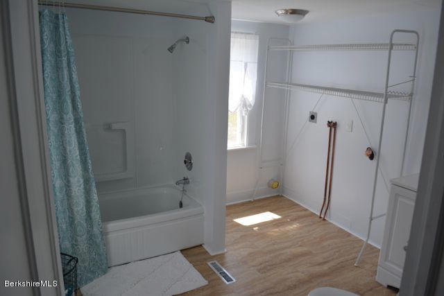 2793 State Road Richmond, MA 01254 - Photo 5 of 20 a bathroom with a bathtub and shower