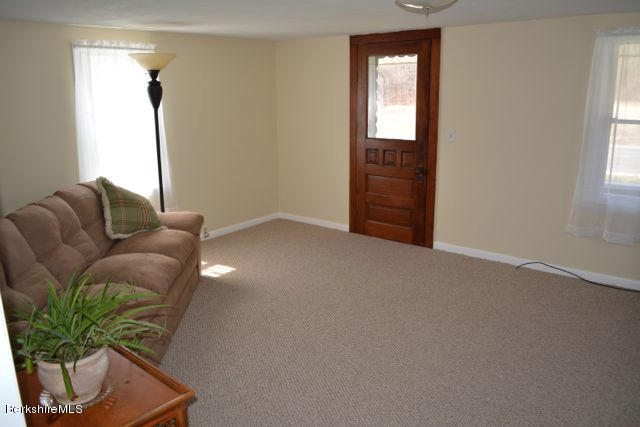 2793 State Road Richmond, MA 01254 - Photo 8 of 20 a living room with furniture and a window