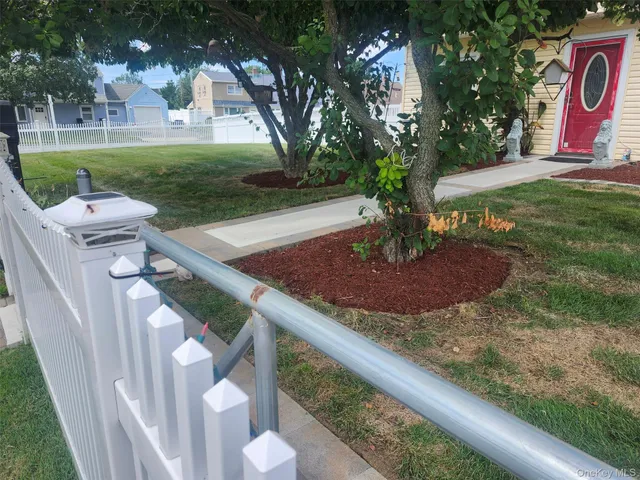 a view of a garden with a fountain