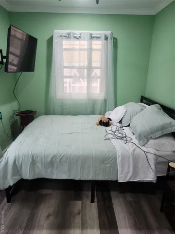 a room with a cabinet and a table