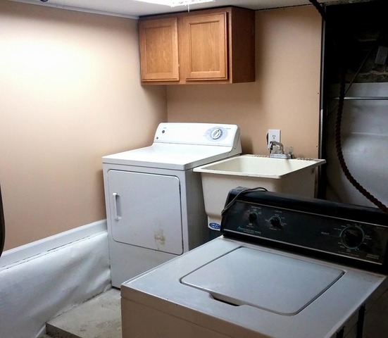 3531 West 65th Street Chicago, IL 60629 - Photo 21 of 25 a room with a stove and a refrigerator