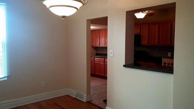 3531 West 65th Street Chicago, IL 60629 - Photo 7 of 25 wooden floor in an empty room