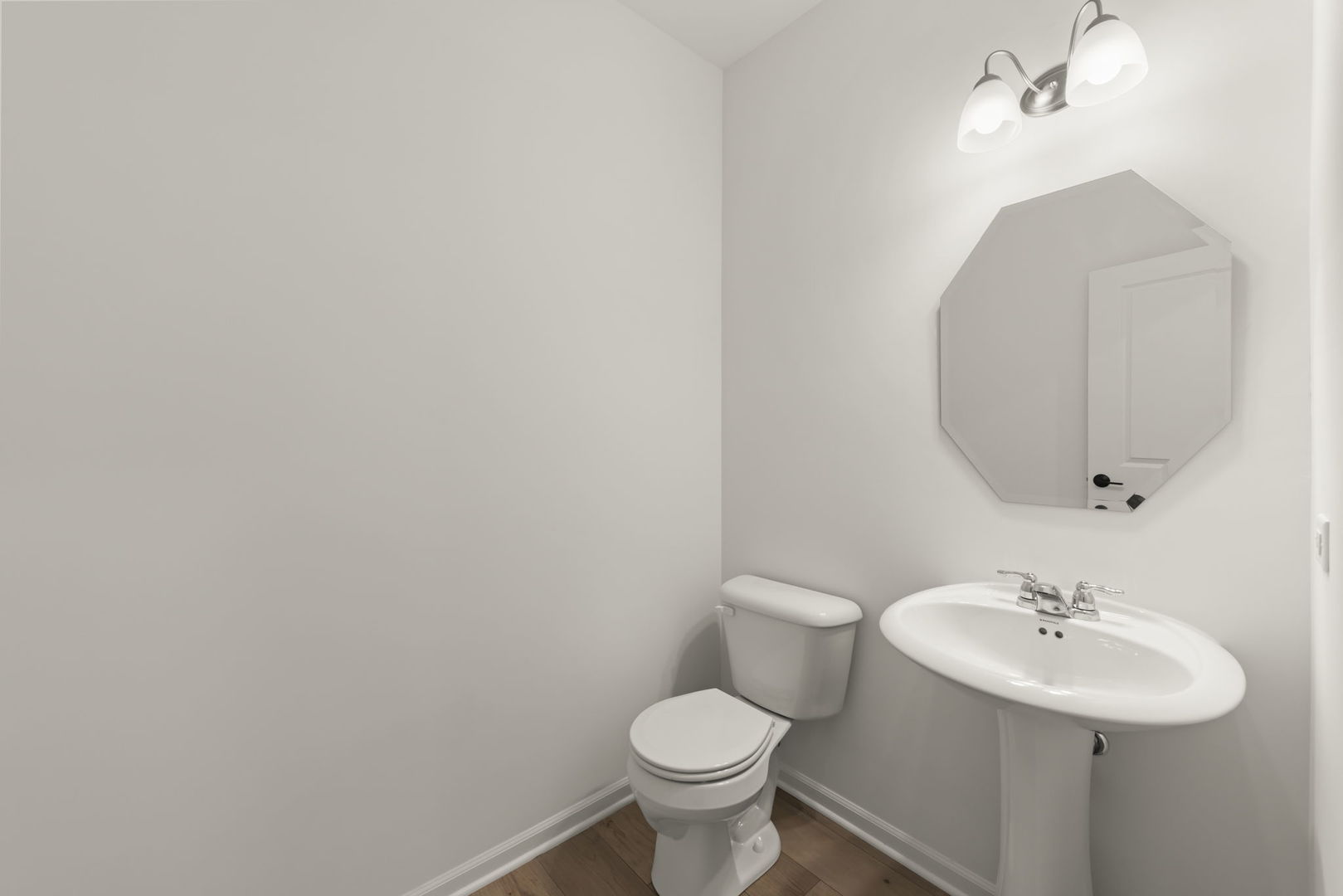 4486 Chelsea Mnr Circle Aurora, IL 60504 - Photo 12 of 23 a bathroom with a sink toilet and a mirror