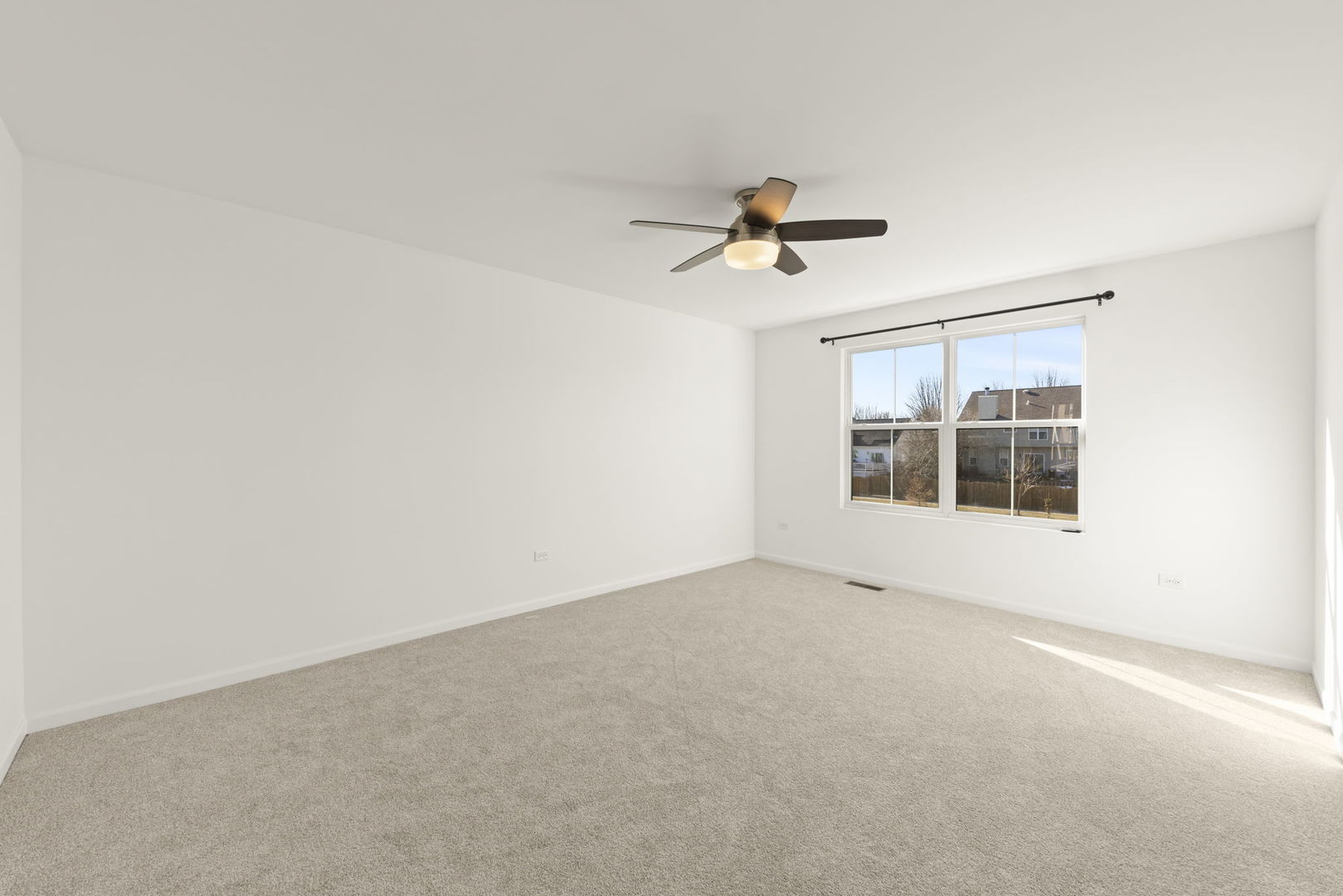 4486 Chelsea Mnr Circle Aurora, IL 60504 - Photo 14 of 23 a view of a big room with carpet