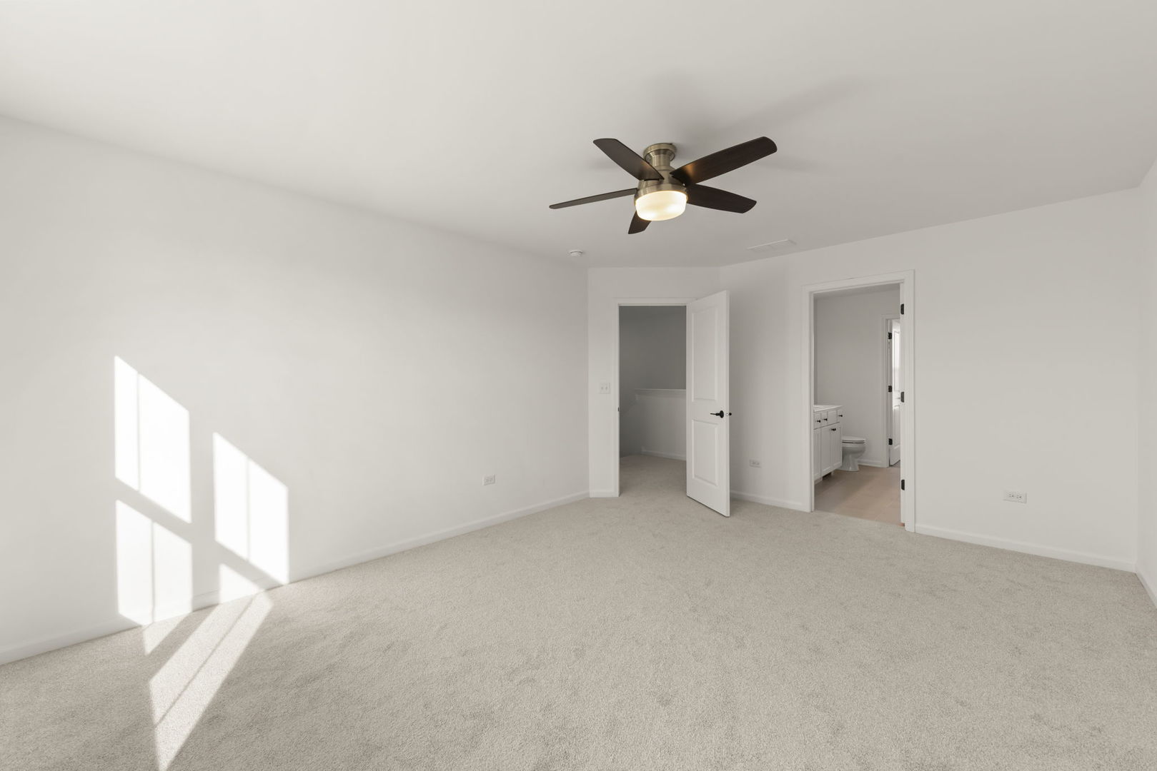 4486 Chelsea Mnr Circle Aurora, IL 60504 - Photo 15 of 23 a view of empty room with a ceiling fan