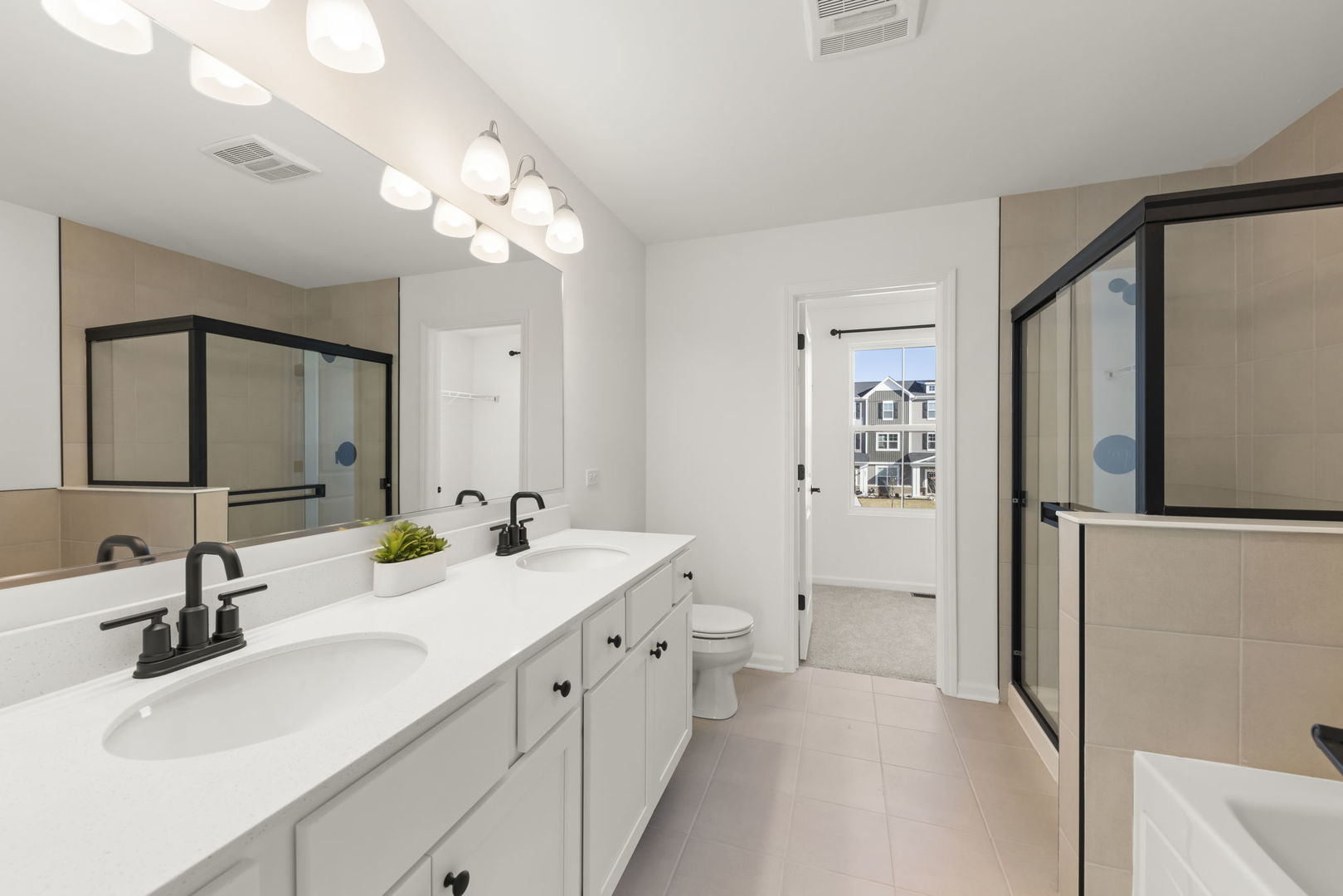 4486 Chelsea Mnr Circle Aurora, IL 60504 - Photo 16 of 23 a bathroom with a double vanity sink mirror and double