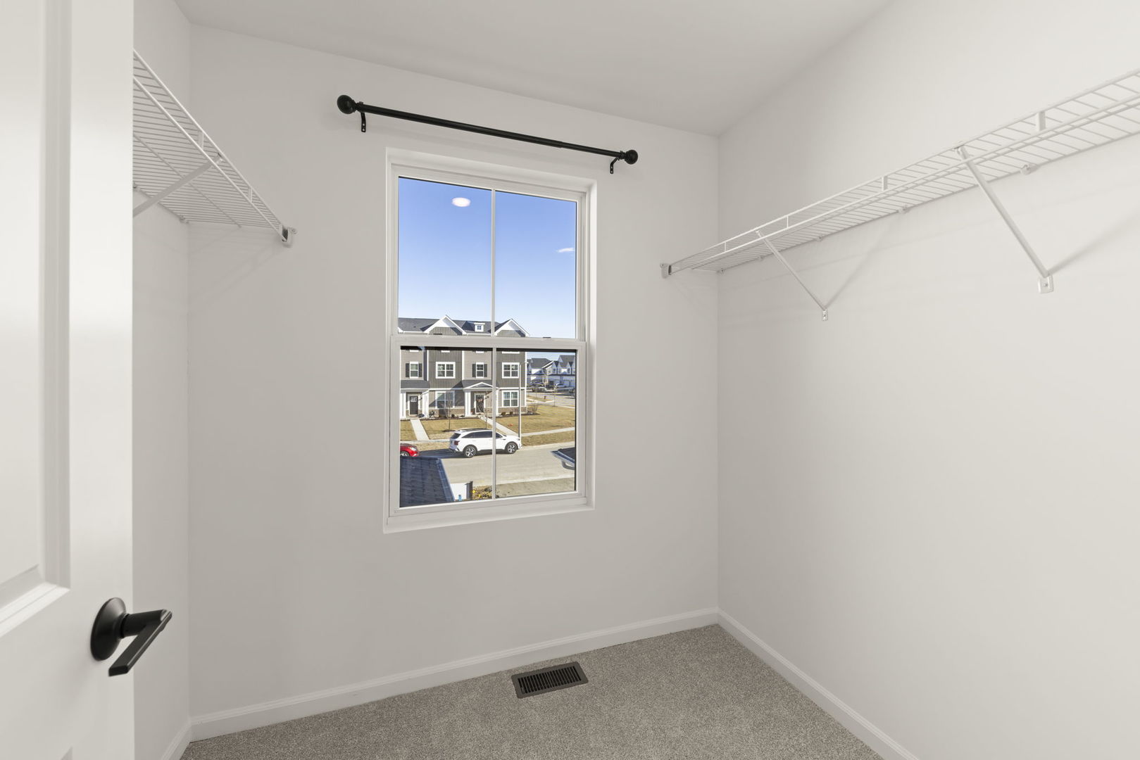 4486 Chelsea Mnr Circle Aurora, IL 60504 - Photo 18 of 23 a bathroom with a window and a shower