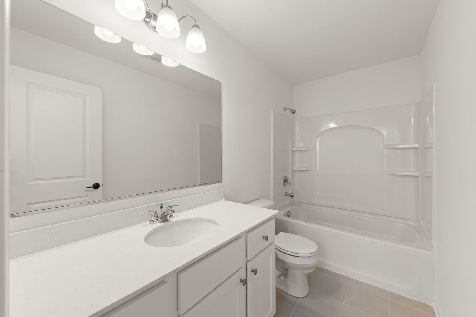 4486 Chelsea Mnr Circle Aurora, IL 60504 - Photo 20 of 23 a bathroom with a toilet a sink a mirror and a shower