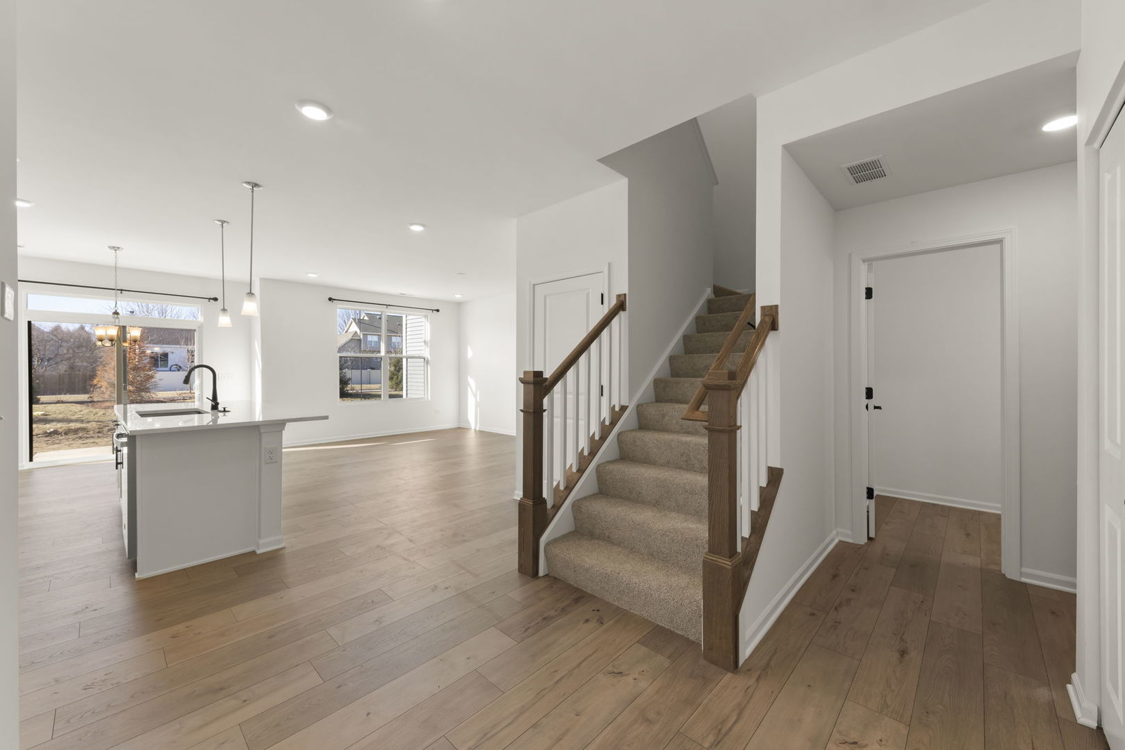 4486 Chelsea Mnr Circle Aurora, IL 60504 - Photo 2 of 23 a view of entryway with wooden floor