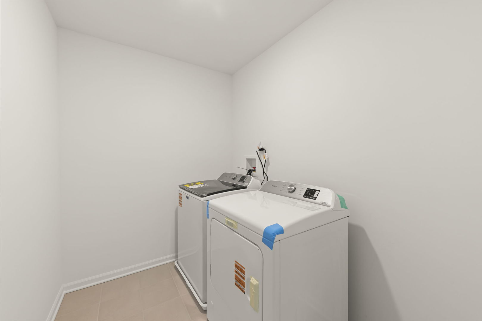 4486 Chelsea Mnr Circle Aurora, IL 60504 - Photo 23 of 23 a utility room with dryer and washer