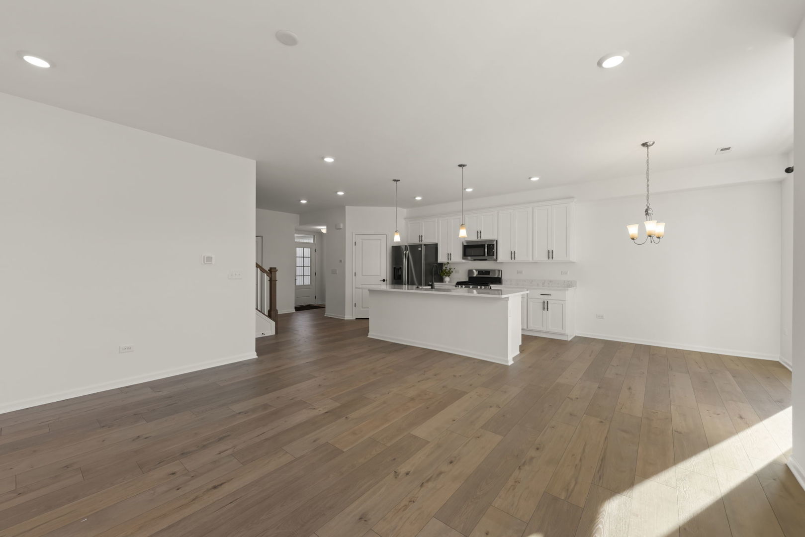 4486 Chelsea Mnr Circle Aurora, IL 60504 - Photo 6 of 23 a view of kitchen with kitchen island and stainless steel appliances