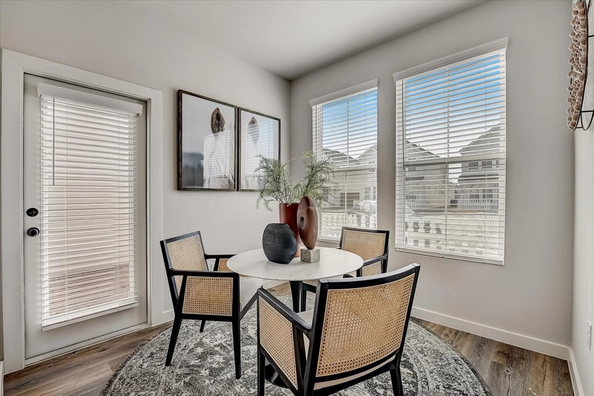 15101 Litsey Crk Drive, Unit 15259H Roanoke, TX 76262 - Photo 7 of 20 a dining room with furniture and window