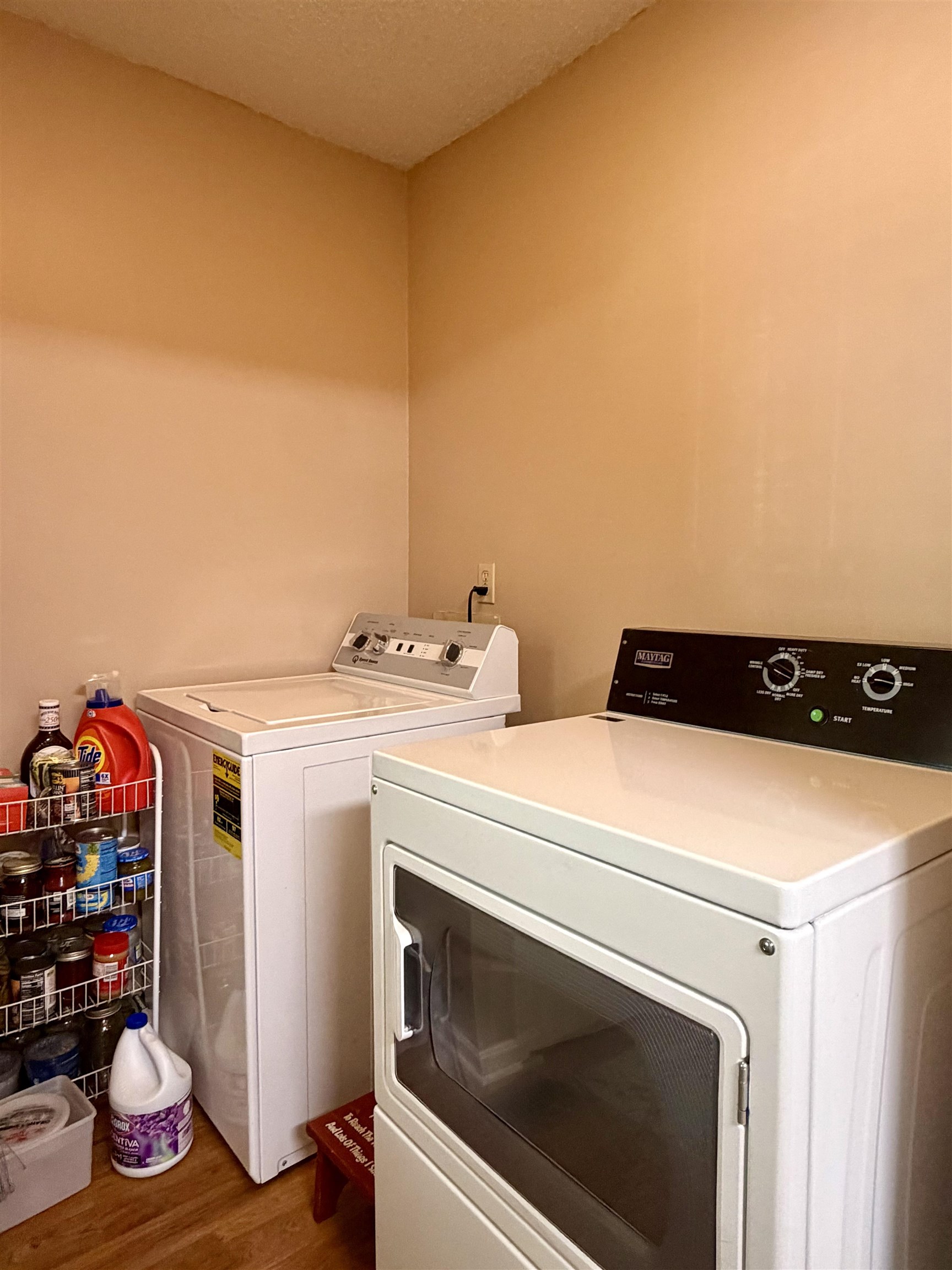 142 Treece Street Selmer, TN 38375 - Photo 25 of 36 Laundry area with light-toned walls and wood-finish flooring