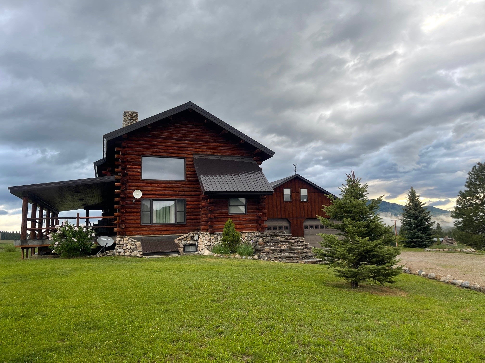 203 Hart Bench Road Darby, MT 59829 - Photo 4 of 56 Spacious. Distinctive. Complete. This log home features a covered deck, heated garage with loft, and private hangar ? everything you need for refined Montana living.