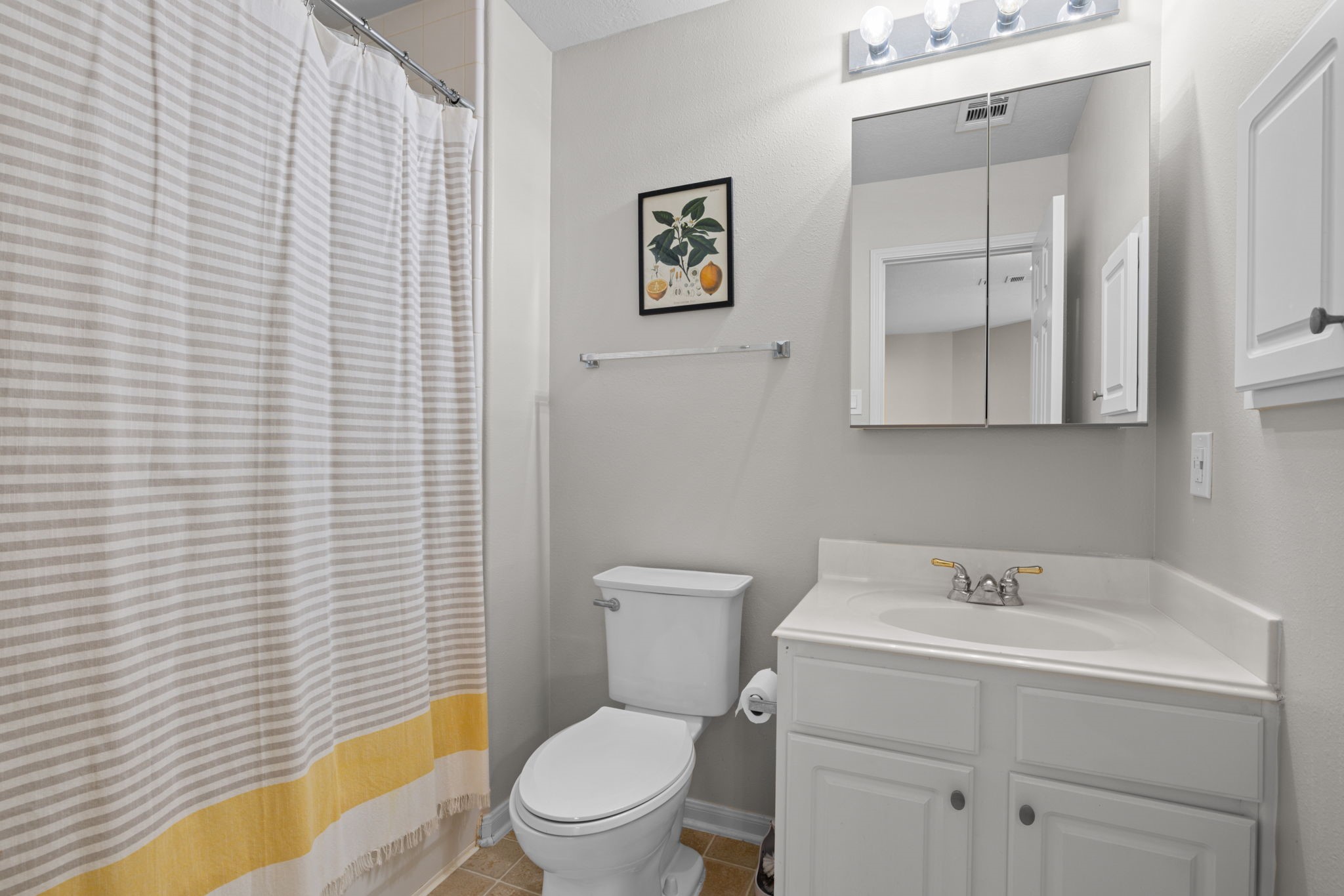 19114 Emory Trail Spring, TX 77388 - Photo 30 of 44 a white toilet sitting next to a bathroom sink