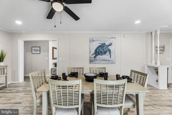 a kitchen with stainless steel appliances a stove a sink and a refrigerator