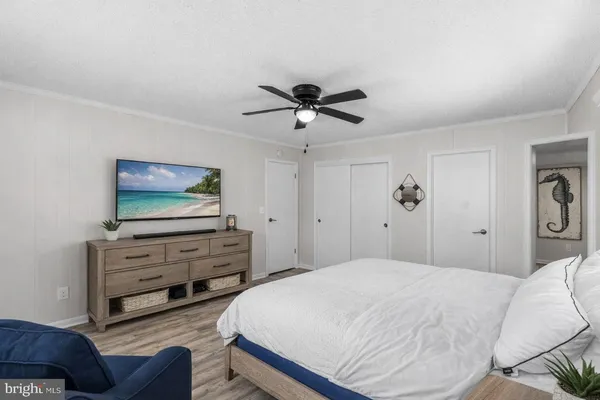 a bathroom with a shower and a sink