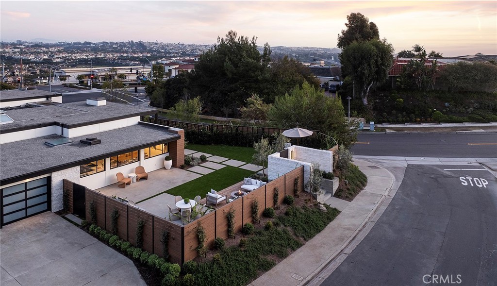 32602 Crete Road Dana Point, CA 92629 - Photo 38 of 41 Large yard with artificial turf, professionally landscaped with lighting perfect for entertaining and those priceless family BBQ's, area has a Gas Fire pit and built in BBQ area