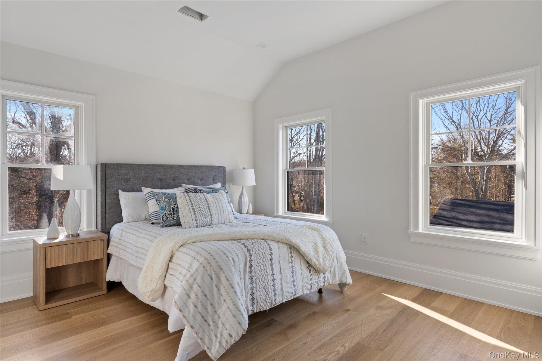 2590 Cox Neck Road Mattituck, NY 11952 - Photo 31 of 50 Beautifully appointed guest bedroom designed to accommodate with ease and sophistication