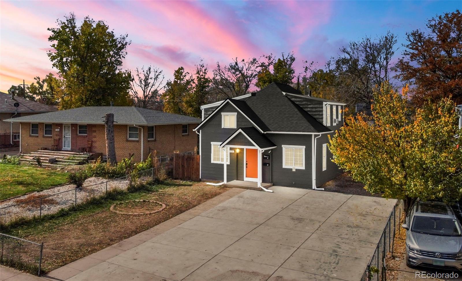 1141 Dayton Street Aurora, CO 80010 - Photo 23 of 23 a front view of a house with a yard