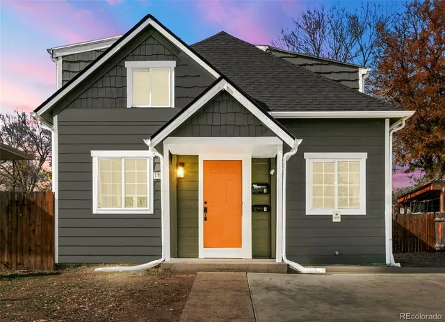 a front view of a house with a garage